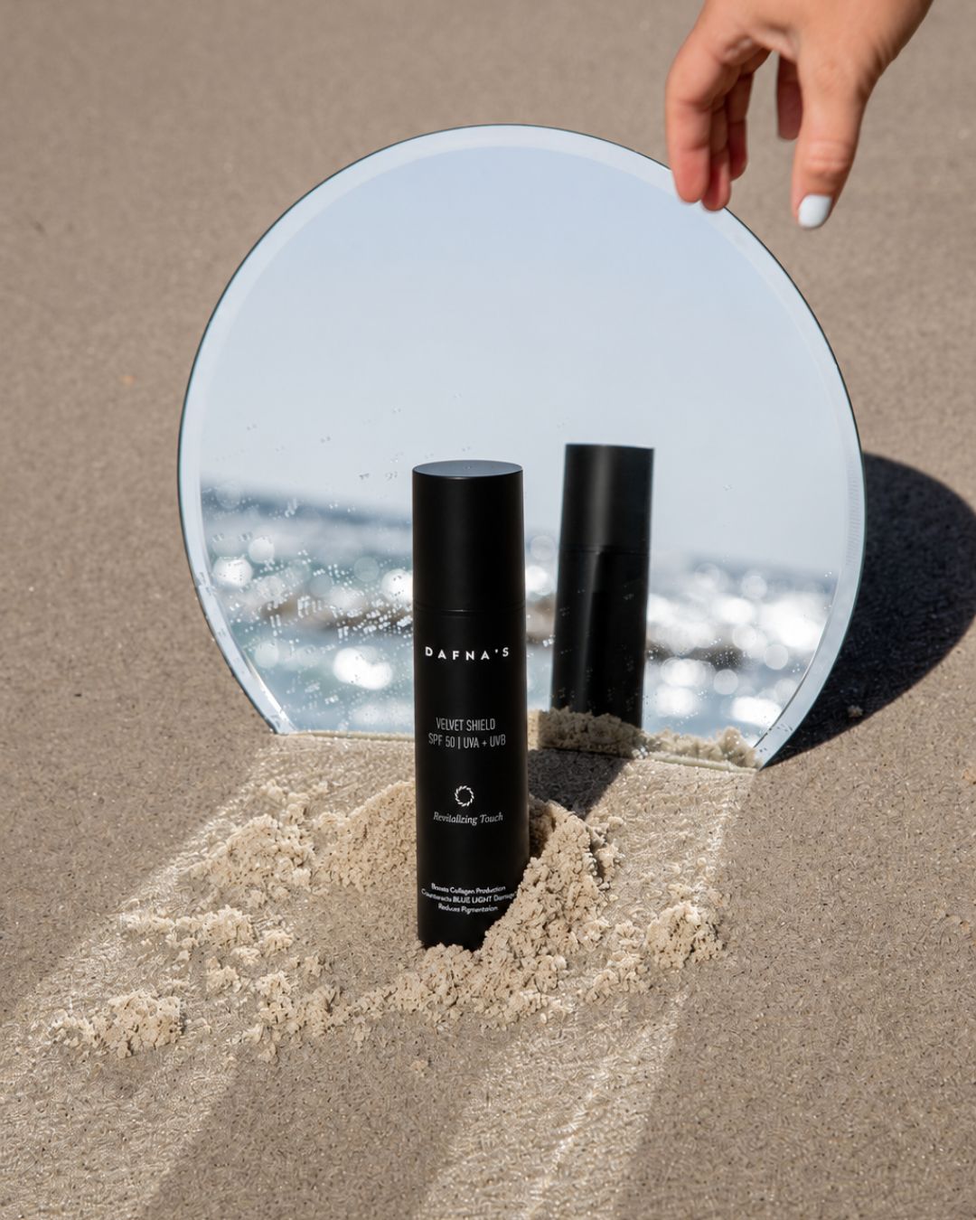 Velvet Shield SPF 50 · Revitalizing Touch