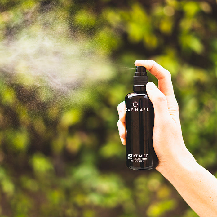 Avitve mist and facial toner in use- misting in the air